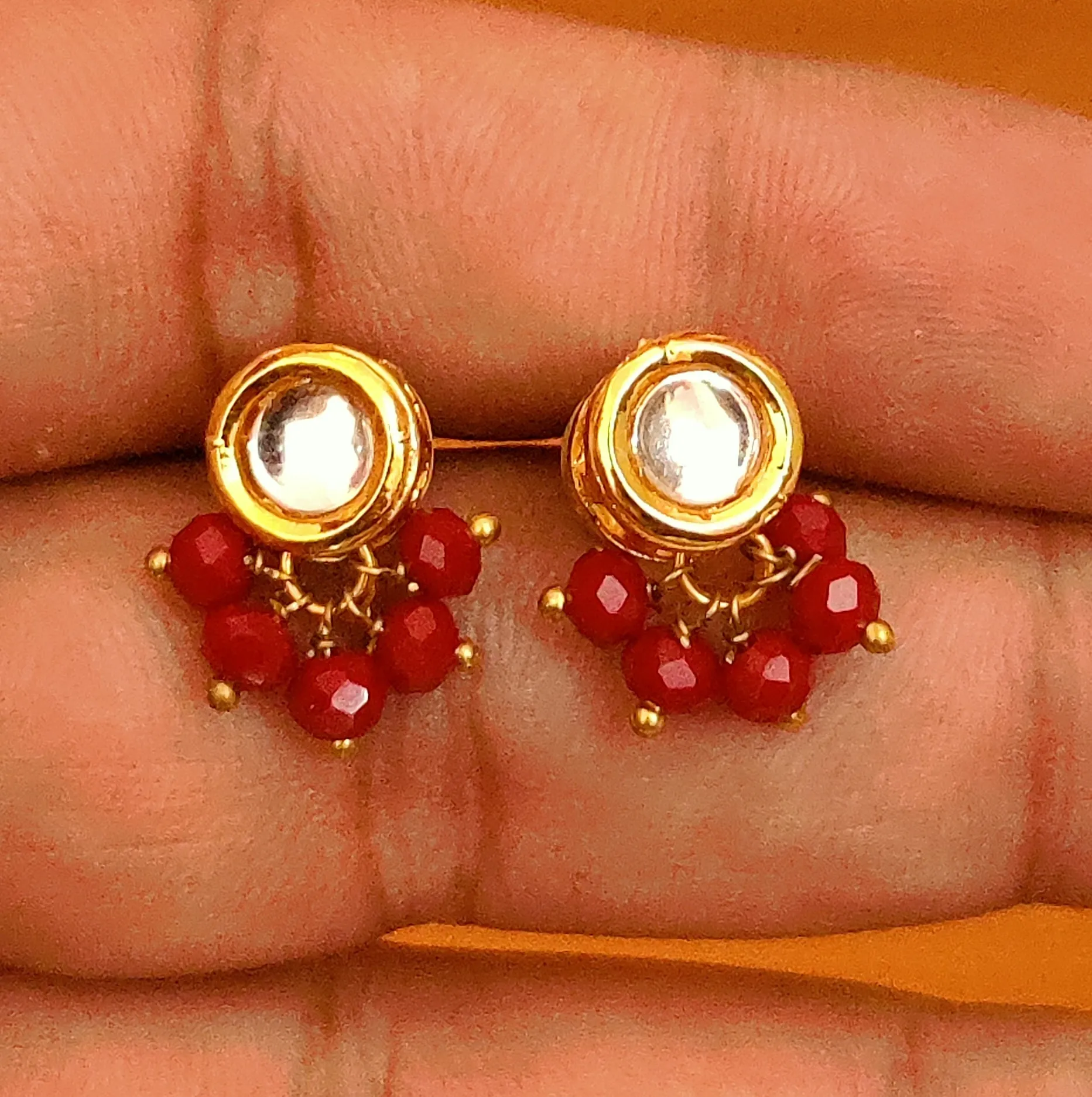 RED CRYSTAL ROUND SHAPED KUNDAN STUDS
